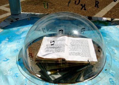 End of wars-bible. Part of the _library chair_ outdoors exhibition. Bible,letters and PVC bubble on wood